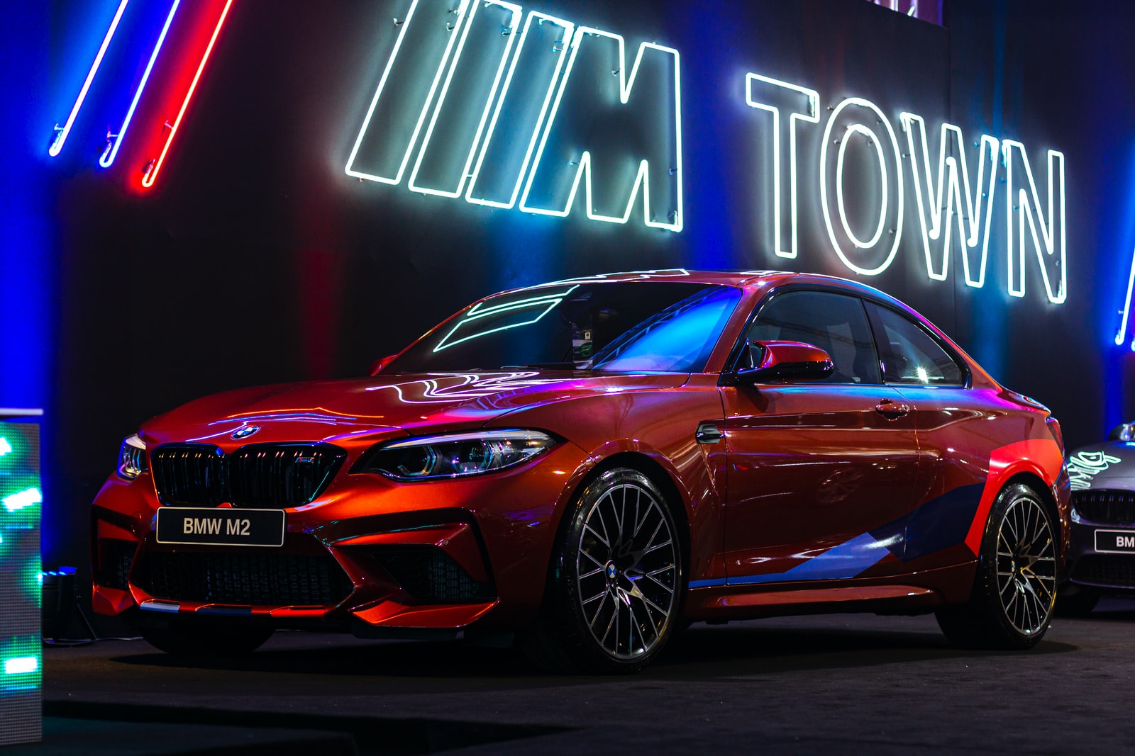 red BMW M2 sedan